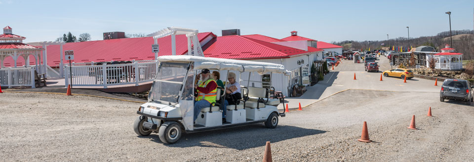 Shuttle rides at the Walnut Creek Amish Flea Market in Holmes County near Sugarcreek, Ohio in Amish Country, shop antiques